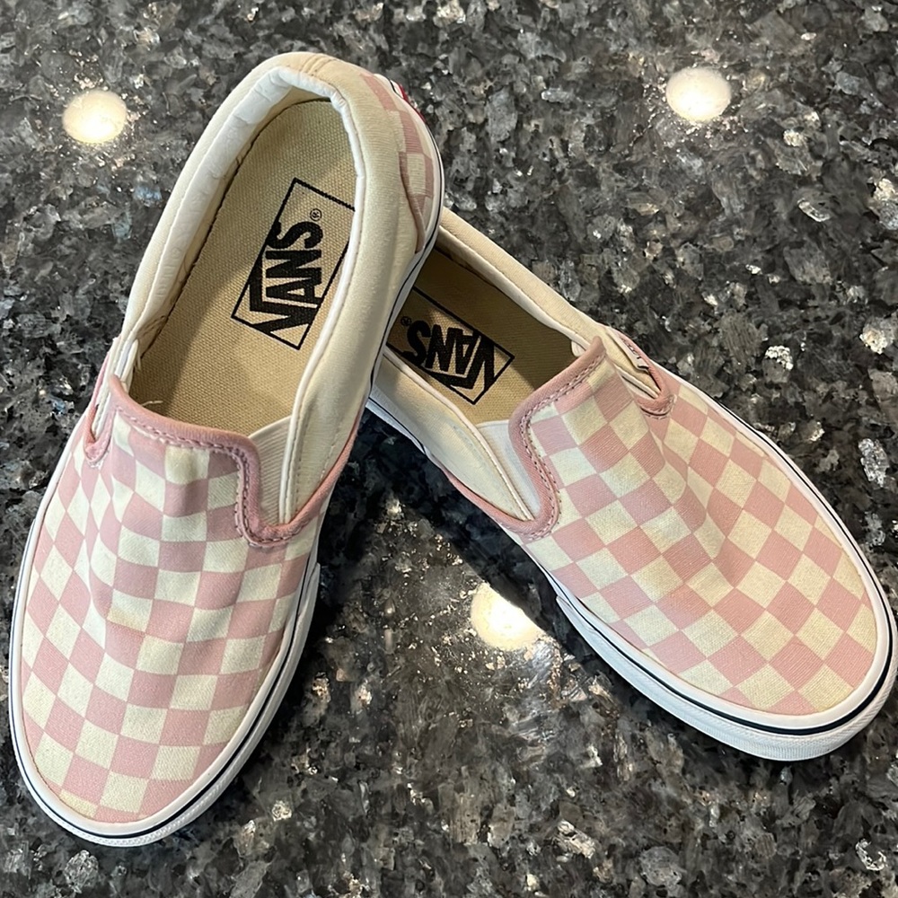 Women’s size 6.5 pink and white checkerboard Canvas upper Vans. Slip on.
